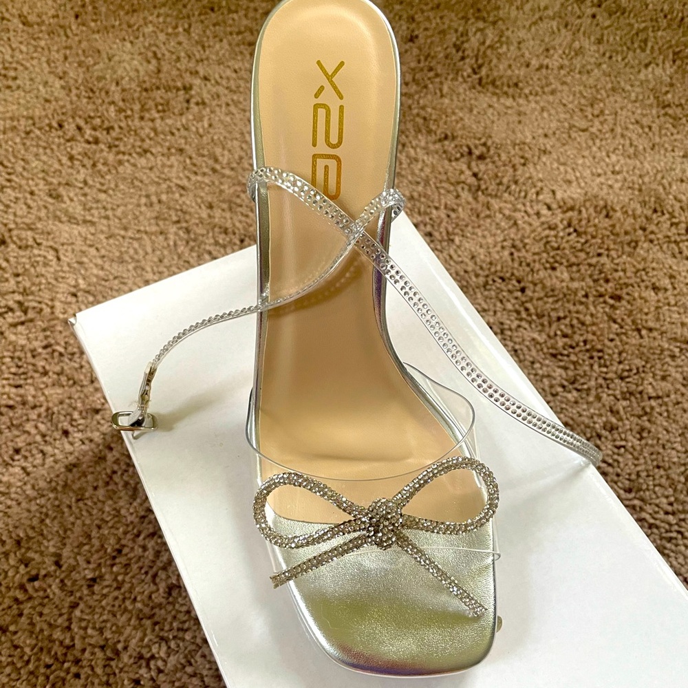 X2B silver bow heels
